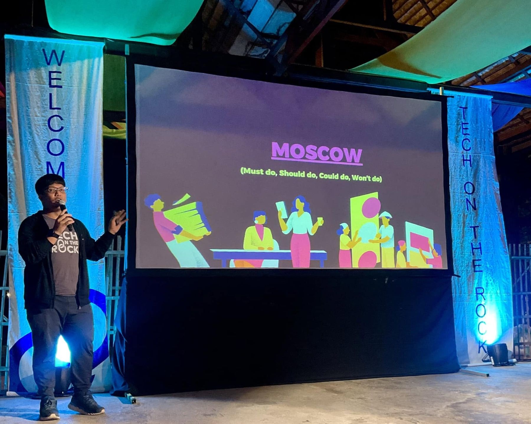 Tananut on stage at CNX Tech on the Rock 2023